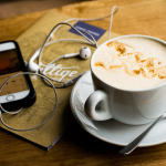 phone, ear pods and coffee