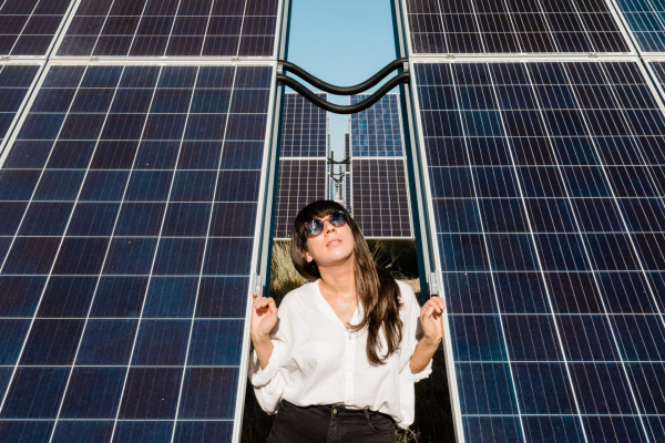 Heidi Lenffer with solar panels 